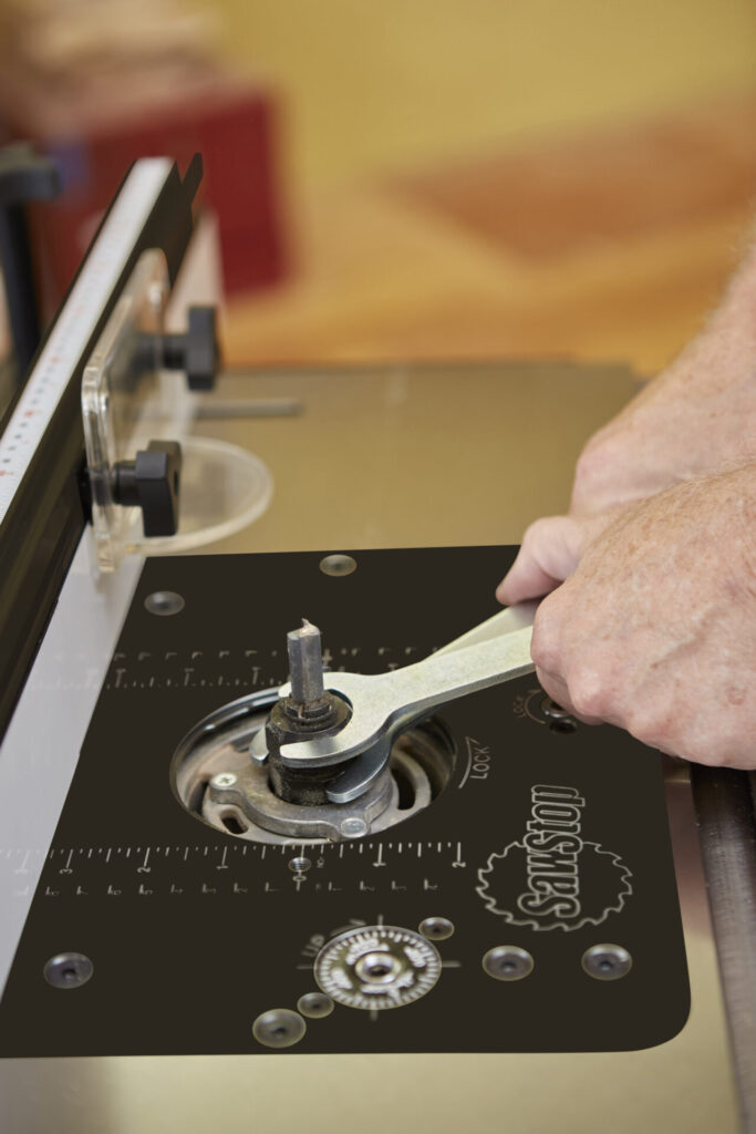 Installing a router bit in a SawStop router lift on a SawStop router table