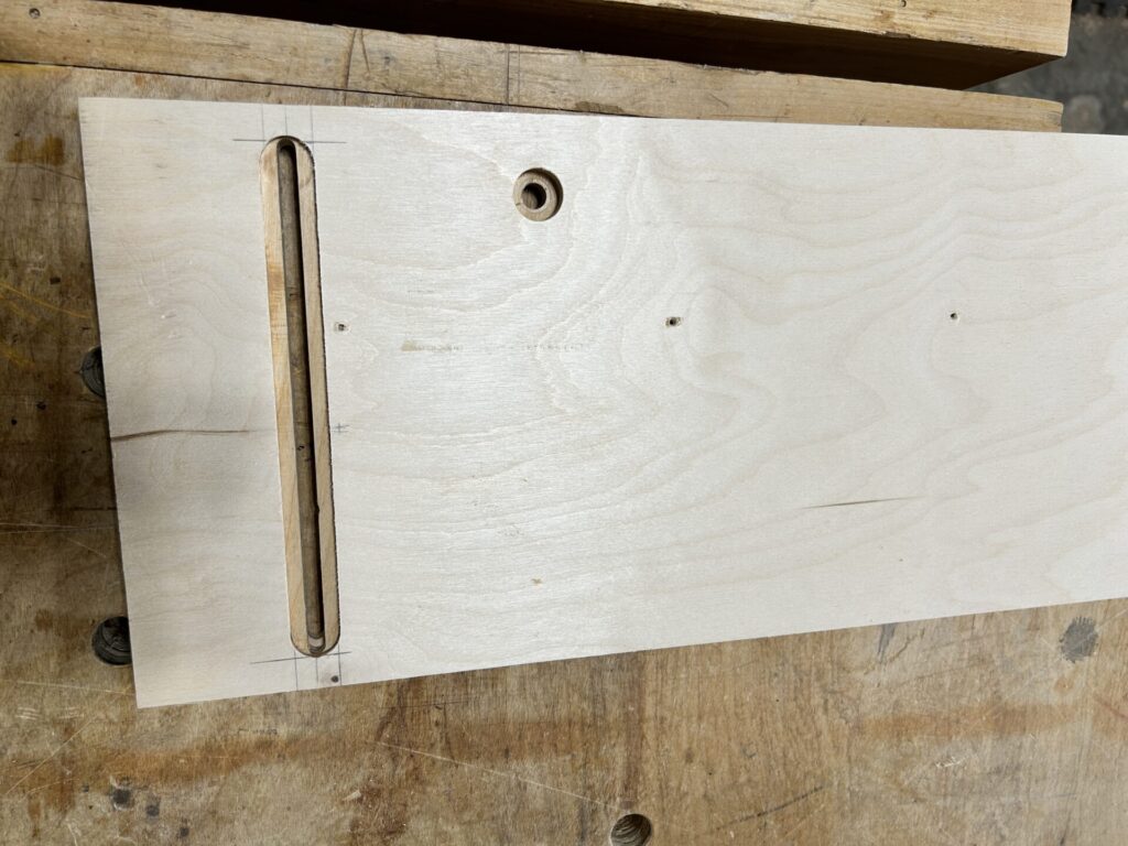 Drill a counterbored hole for the handle bolt